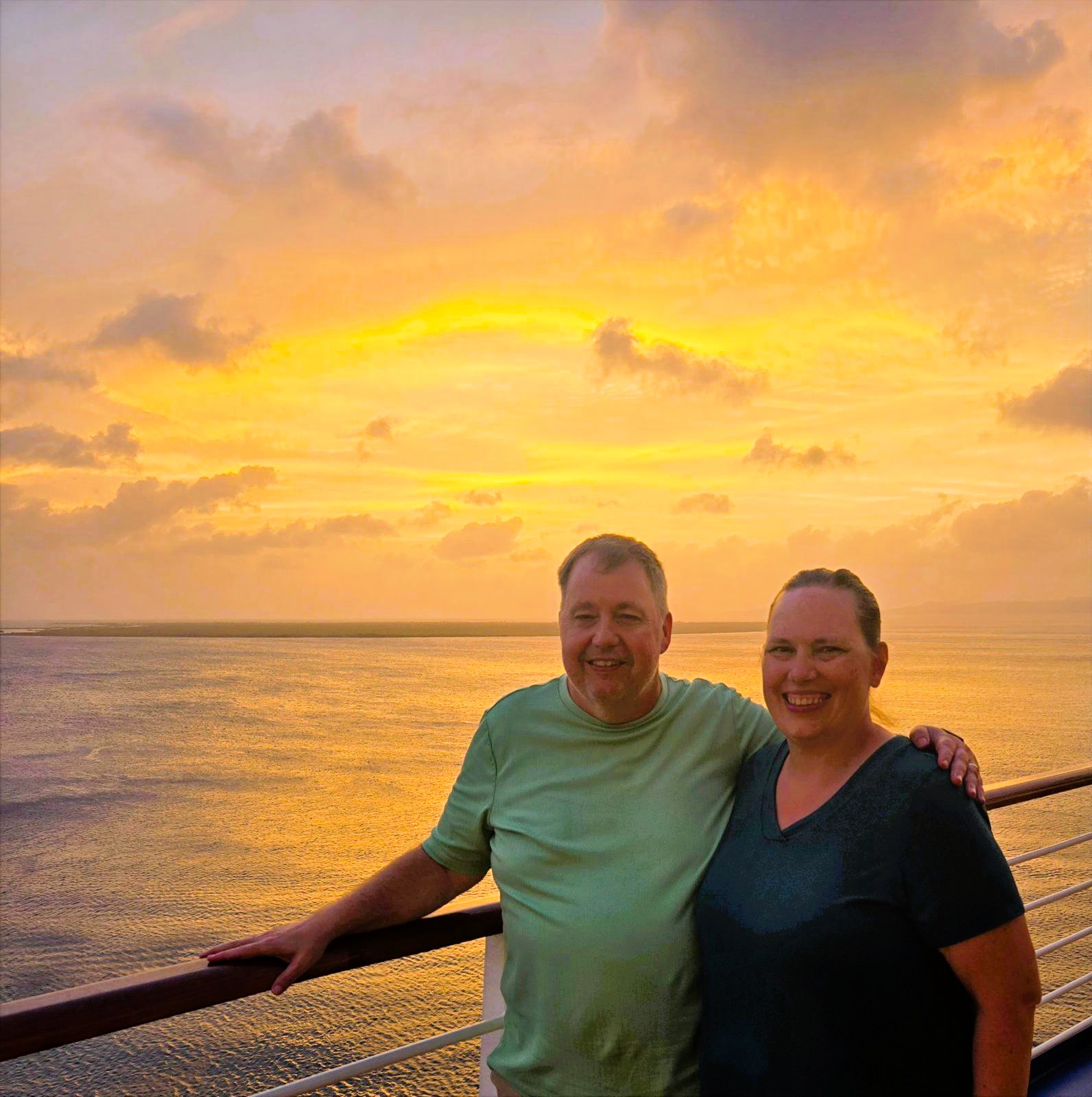 Cyra and Chris on a cruise at sunset